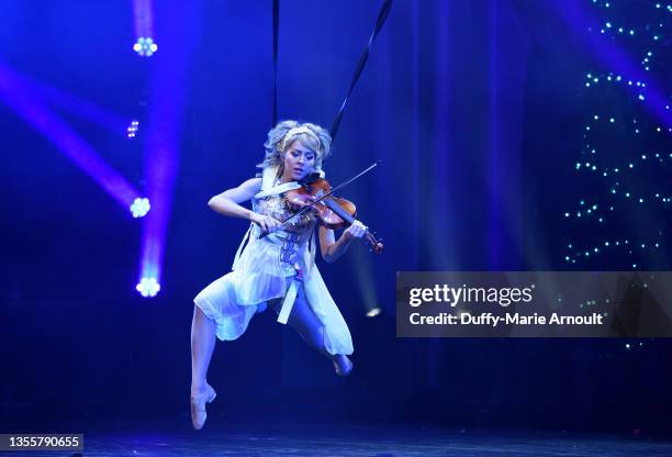 Violinist Lindsey Stirling performs during her Christmas Program Winter Tour at Cannon Center For The Performing Arts on November 26, 2021 in...