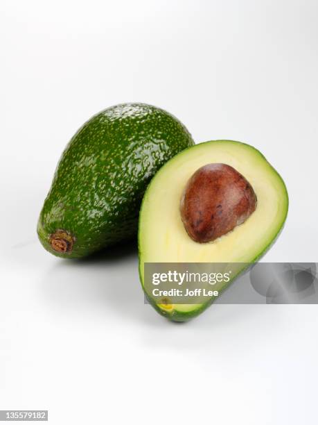 avocado - avocado isolated stock-fotos und bilder