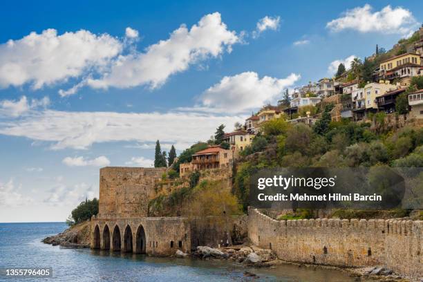 cityscape of alanya/turkey - shipyard - alanya castle stock pictures, royalty-free photos & images