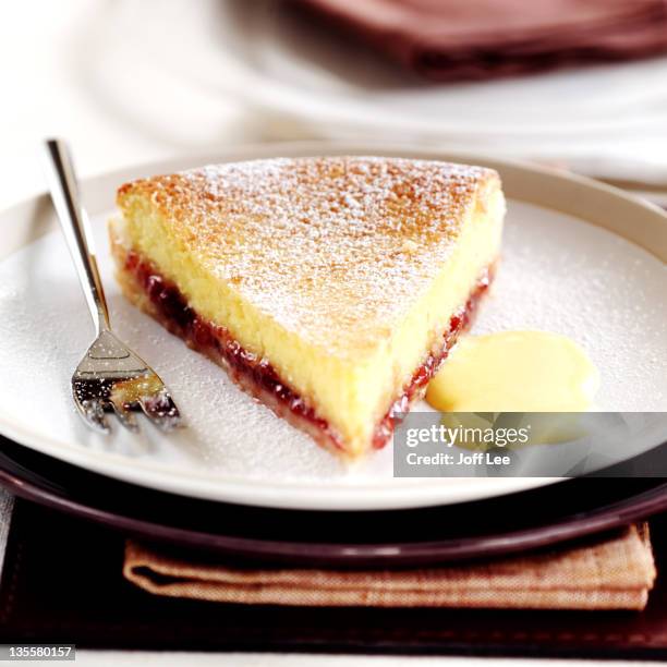 slice of bakewell tart - custard stock pictures, royalty-free photos & images