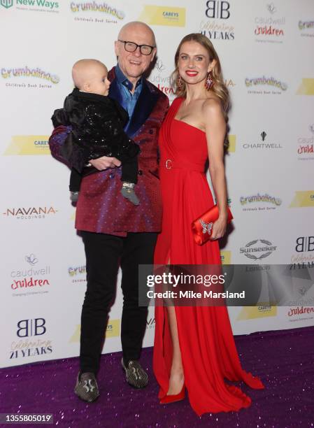 John Caudwell and Modesta Vzesniauskaite attend the Caudwell Children Butterfly Ball at The Roundhouse on November 26, 2021 in London, England.