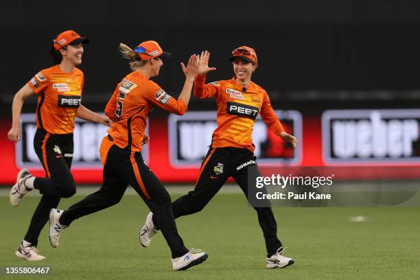 Chloe Piparo of the Scorchers celebrates after taking a catch to dismiss Tahlia McGrath of the Strikers during the Women's Big Bash League Final...