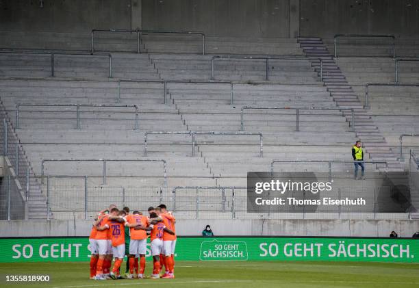 Empty stands in fact of the new COVID-19 restrictions in german state Saxony with the slogan "So geht sächsisch" at the advertising boards prior the...