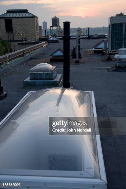 penthouse rooftop view at sunset - skylight stock pictures, royalty-free photos & images