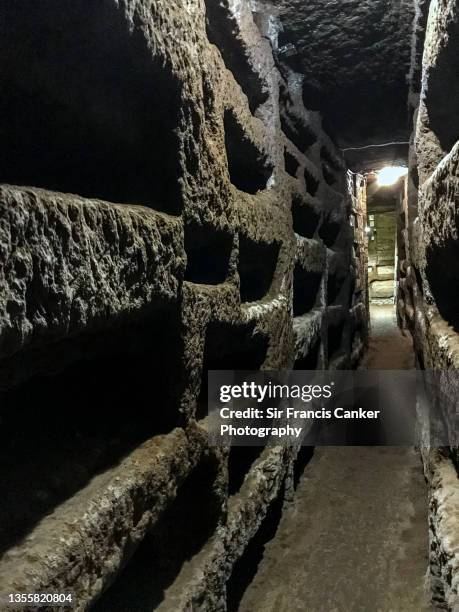 roman catacomb of callixtus (catacombe di san callisto) near rome in lazio, italy - catacomb stock pictures, royalty-free photos & images