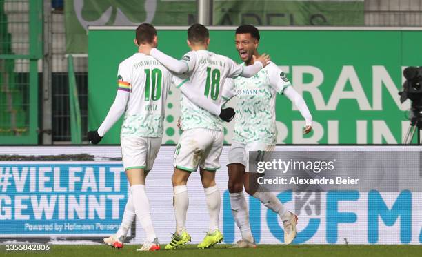 Timothy Tillman of SpVgg Greuther Furth celebrates with teammates after scoring their side's second goal during the Bundesliga match between SpVgg...