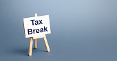 Tax break easel. Avoiding or deferring tax payments. Refund of taxes deductions according to law. State support of business for a period of adverse conditions and economic crisis. Privileges