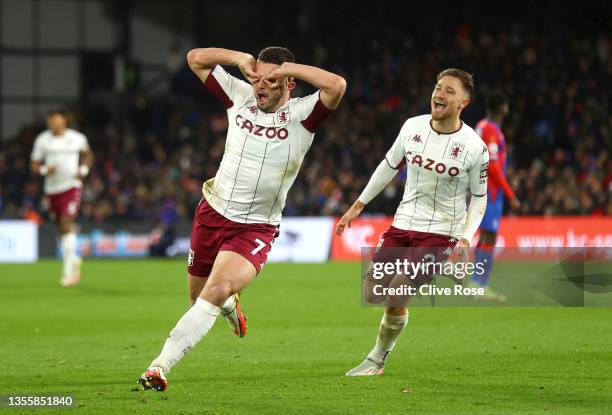 John McGinn of Aston Villa celebrates after scoring their side's second goal during the Premier League match between Crystal Palace and Aston Villa...