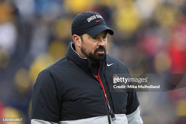 Head coach Ryan Day of the Ohio State Buckeyes looks on during warm-ups prior to the game against the Michigan Wolverines at Michigan Stadium on...