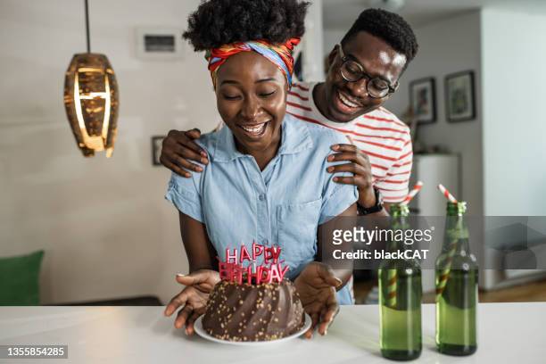 birthday surprise and celebration at home - holding birthday cake stock pictures, royalty-free photos & images