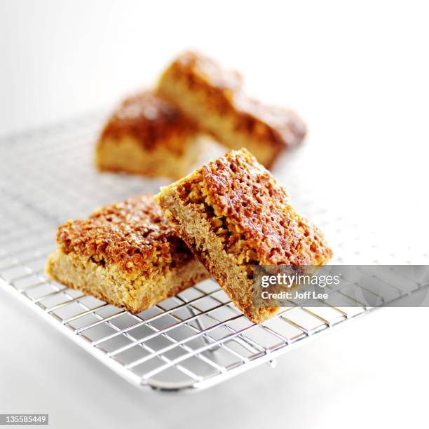 flapjacks on cooling rack - flapjack stock pictures, royalty-free photos & images