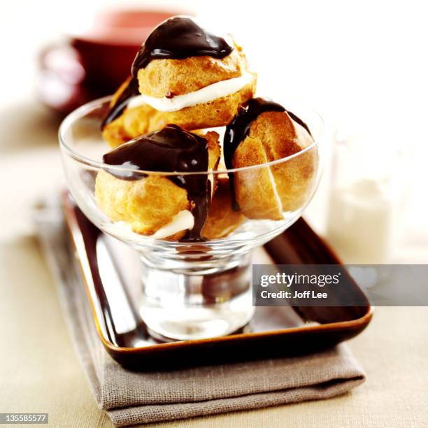 profiteroles - profiterole stock pictures, royalty-free photos & images