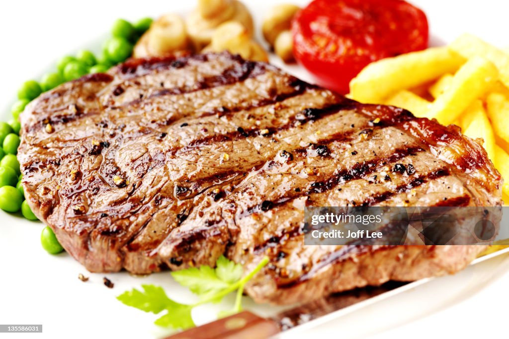 Rump steak with chips and peas