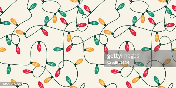 nahtlose reihe von bunten weihnachtslichtern - tangled christmas lights stock-grafiken, -clipart, -cartoons und -symbole