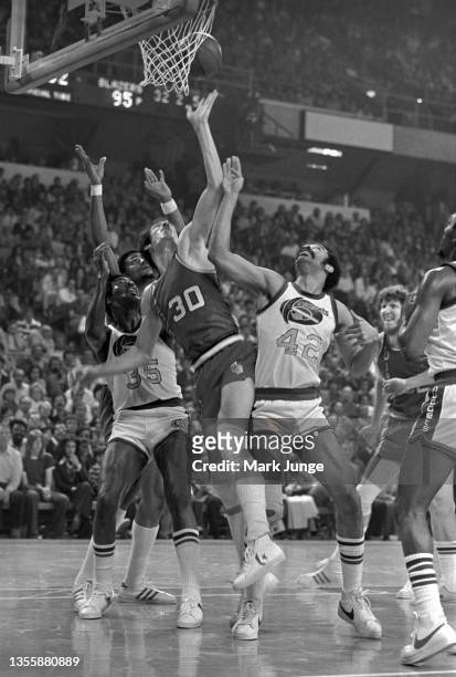Portland Trail Blazers small forward Bob Gross attempts a layup under the rim during an NBA playoff game against the Denver Nuggets at McNichols...