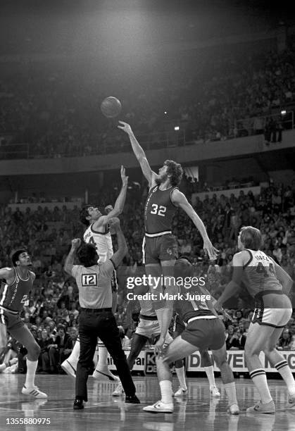 Portland Trail Blazers center Bill Walton wins the tipoff against Denver Nuggets forward Bobby Jones during an NBA playoff game against the Denver...