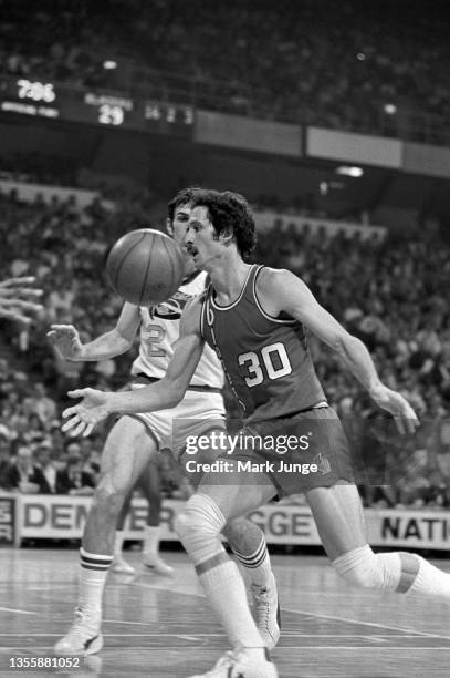 Portland Trail Blazers forward Bob Gross flips the ball to a teammate during an NBA playoff game against the Denver Nuggets at McNichols Arena on May...