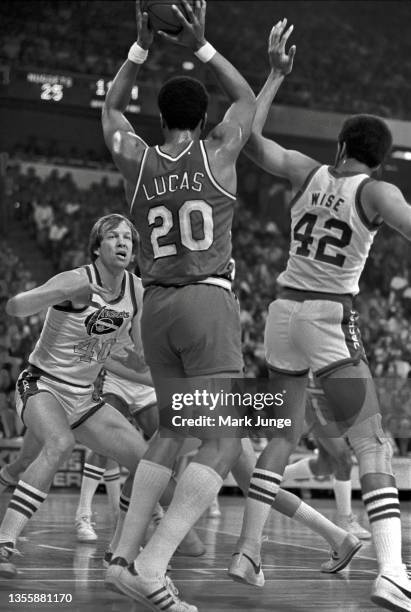 Portland Trail Blazers forward Maurice Lucas aims a pass toward a teammate during a playoff loss against the Denver Nuggets at McNichols Arena on May...