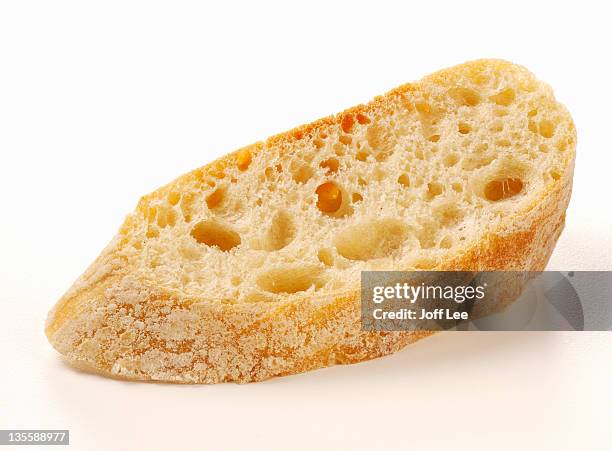 slice of ciabatta - ciabatta stock pictures, royalty-free photos & images