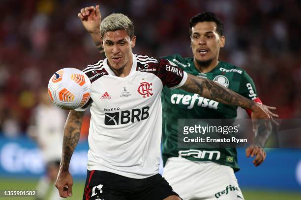 Pedro of Flamengo fights for the ball with Gustavo Gomez of Palmeiras during the final match of Copa CONMEBOL Libertadores 2021 between Palmeiras and...
