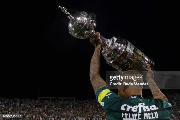 Felipe Melo of Palmeiras holds the the Copa CONMEBOL Libertadores Champions trophy after the final match of Copa CONMEBOL Libertadores 2021 between...