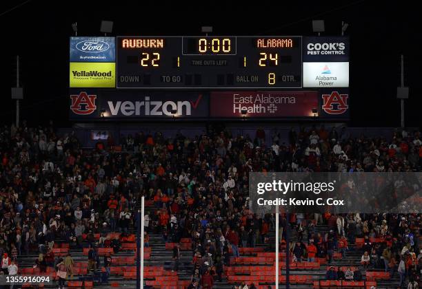 View of the scoreboard after the Alabama Crimson Tide defeated the Auburn Tigers 24-22 in the fourth overtime at Jordan-Hare Stadium on November 27,...