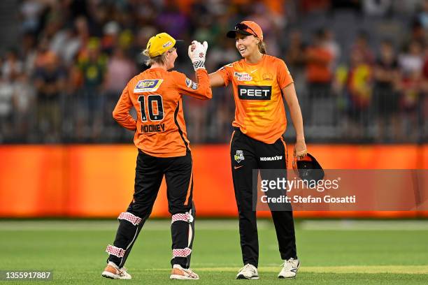 Beth Mooney and Piepa Cleary of the Scorchers celebrate after winning the Women's Big Bash League match between the Perth Scorchers and the Adelaide...
