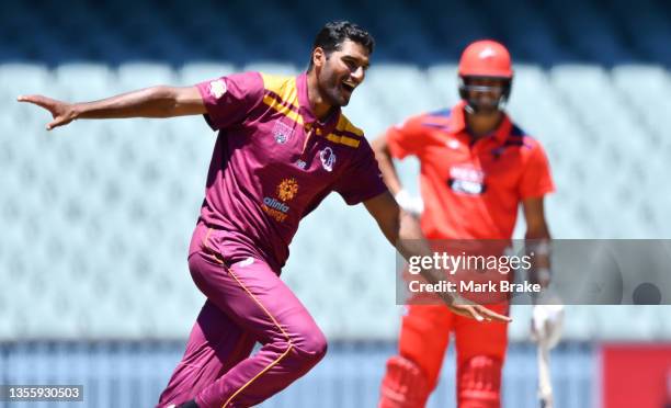 Gurinder Sandhu of the Queensland Bulls celebrates the wicket of Nathan McAndrew of the Redbacks during the Marsh One Day Cup match between South...