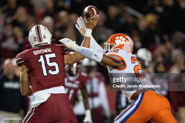 Quarterback Jason Brown of the South Carolina Gamecocks is pressured by linebacker Trenton Simpson of the Clemson Tigers in the third quarter during...