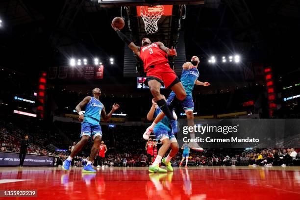 Kevin Porter Jr. #3 of the Houston Rockets drives to the net during the first half against the Charlotte Hornets at Toyota Center on November 27,...