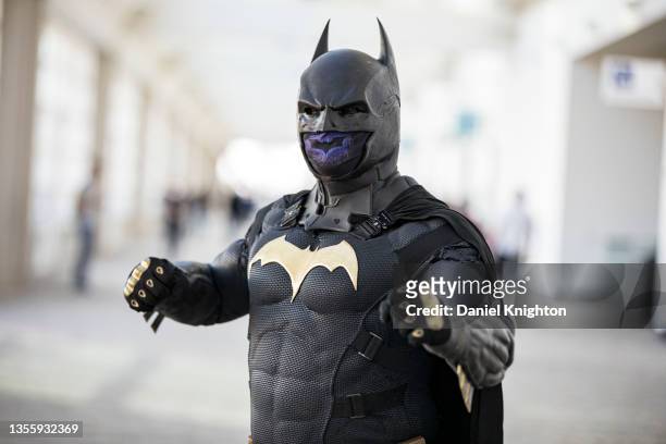 Cosplayer Shawn Richter as Batman poses for photos at 2021 Comic-Con: Special Edition on November 27, 2021 in San Diego, California. Comic-Con...