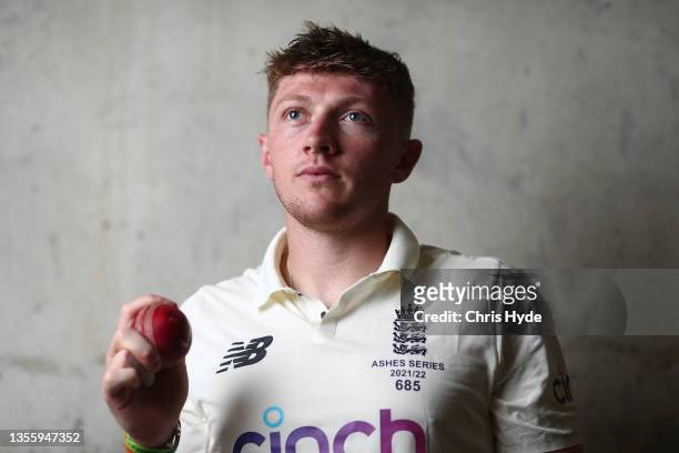 Dom Bess poses during an England Ashes Squad portrait session at The Gabba on November 28, 2021 in Brisbane, Australia.
