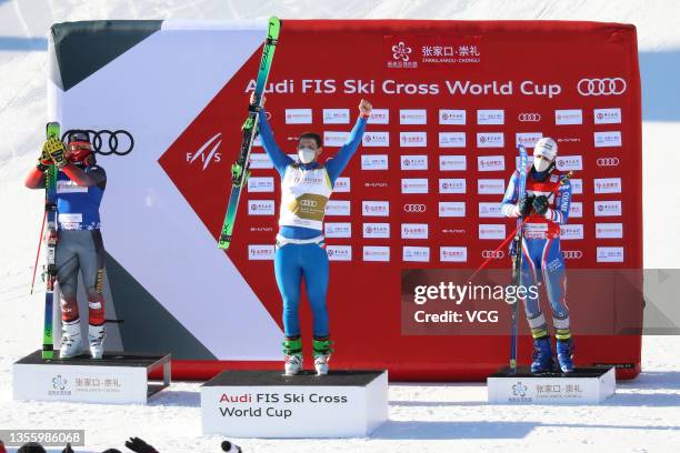 Silver medalist Brady Leman of Canada, gold medalist Sergey Ridzik of Russia and bronze medalist Bastien Midol of Fance celebrate on the podium after...