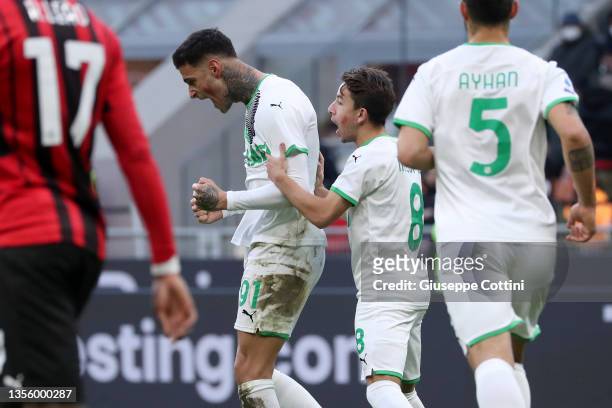 Gianluca Scamacca of US Sassuolo celebrates after scoring the his team's second goal during the Serie A match between AC Milan and US Sassuolo at...