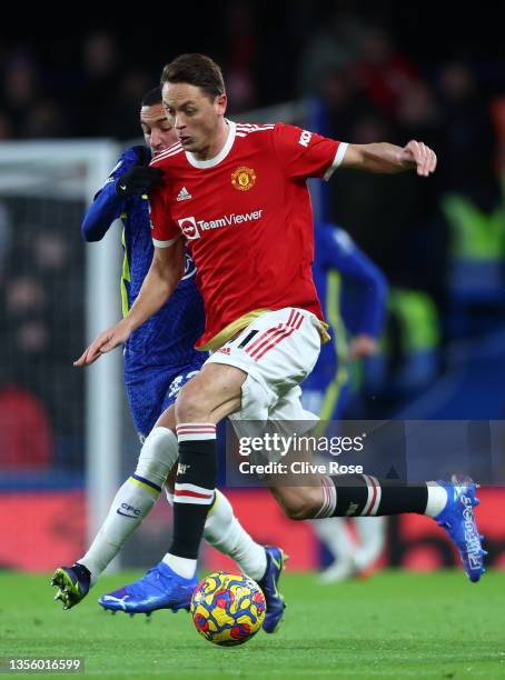 Nemanja Matic of Manchester United is challenged by Hakim Ziyech of Chelsea during the Premier League match between Chelsea and Manchester United at...