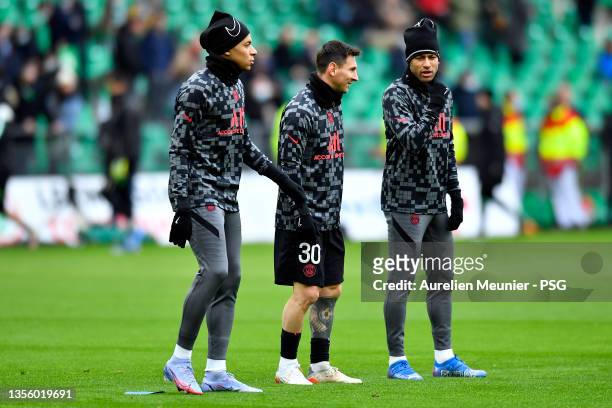Kylian Mbappe, Leo Messi and Neymar Jr of Paris Saint-Germain warmup before the Ligue 1 Uber Eats match between AS Saint-Etienne and Paris Saint...