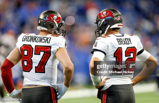 Tom Brady and Rob Gronkowski of the Tampa Bay Buccaneers talk before the game against the Indianapolis Colts at Lucas Oil Stadium on November 28,...