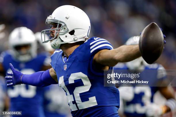 Andrew Sendejo of the Indianapolis Colts celebrates a fumble recovery in the first half of the game against the Tampa Bay Buccaneers at Lucas Oil...