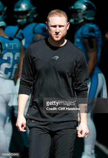 Offensive Coordinator Joe Brady Carolina Panthers takes the field before the game against the Miami Dolphins at Hard Rock Stadium on November 28,...
