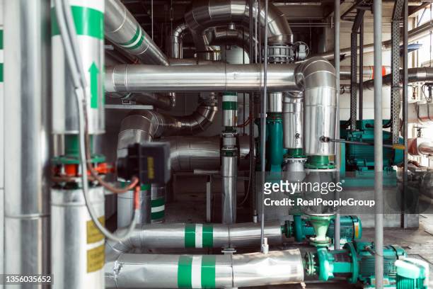 view of the inside of heating plant - pipes and ventilation stock pictures, royalty-free photos & images