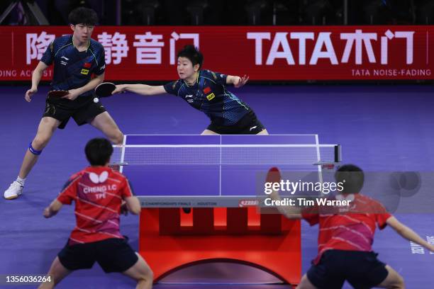 Sun Yingsha of China plays a shot against Lin Yun-Ju and Cheng I-Ching of Chinese Taipei during the mixed doubles semifinals match of the 2021 ITTF...