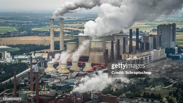 aerial view of a coal burning power plant - burning coal stock pictures, royalty-free photos & images