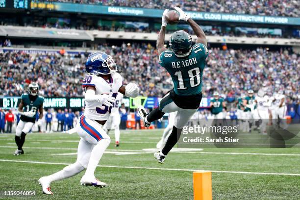 Jalen Reagor of the Philadelphia Eagles makes a first down catch against Darnay Holmes of the New York Giants in the second quarter at MetLife...