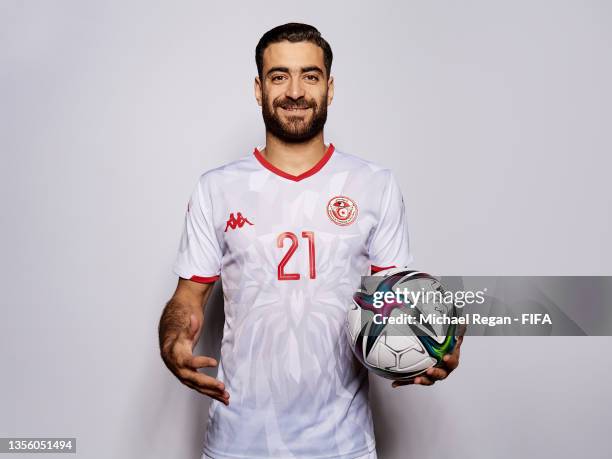 Hamza Mathlouthi of Tunisia poses during the Tunisia team presentation prior to the FIFA Arab Cup Qatar 2021 at Grand Hyatt Doha Hotel on November...