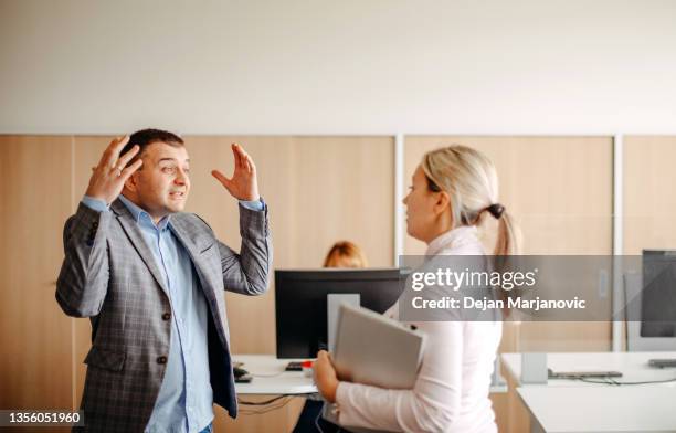 mobbing on job - bossy stock pictures, royalty-free photos & images