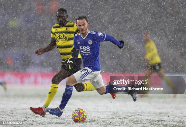 James Maddison of Leicester holds off Moussa Sissoko of Watford during the Premier League match between Leicester City and Watford at The King Power...