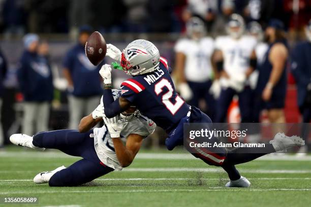 Jalen Mills of the New England Patriots breaks up a pass intended to Nick Westbrook-Ikhine of the Tennessee Titans in the fourth quarter at Gillette...