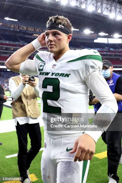 Zach Wilson of the New York Jets reacts after defeating the Houston Texans at NRG Stadium on November 28, 2021 in Houston, Texas.