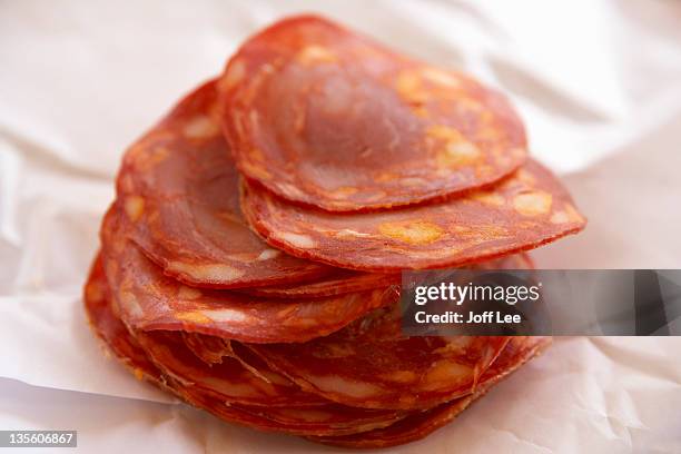 slices of chorizo - chorizo stock pictures, royalty-free photos & images