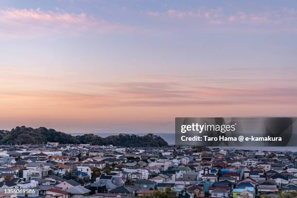 residential district by the sea in kanagawa of japan - japan sunrise stockfoto's en -beelden